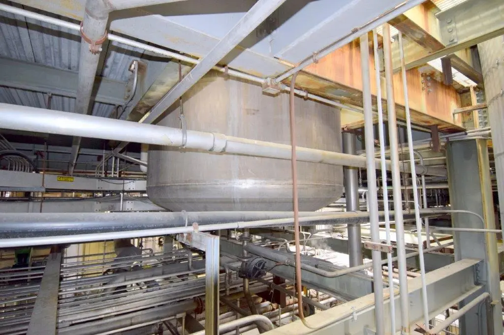 Mason Steel Tank, Approximately 2,500 Gallons, Stainless Steel, Vertical.